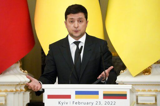 Ukrainian President Volodymyr Zelenskyy gestures while speaking during a joint news conference with Polish President Andrzej Duda and Lithuania