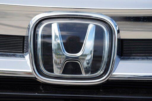 FILE - The Honda company logo is shown outside a Honda dealership Sunday, Sept. 12, 2021, in Highlands Ranch, Colo. U.S. auto safety regulators are investigating complaints that the automatic emergency braking systems on more than 1.7 million newer Hondas can stop the vehicles for no reason. The National Highway Traffic Safety Administration says, on Thursday, Feb. 24, 2022, it has 278 complaints that the problem can happen in 2017 through 2019 CR-Vs and 2018 and 2019 Accords. (AP Photo/David Zalubowski, File)    PHOTO CREDIT: David Zalubowski
