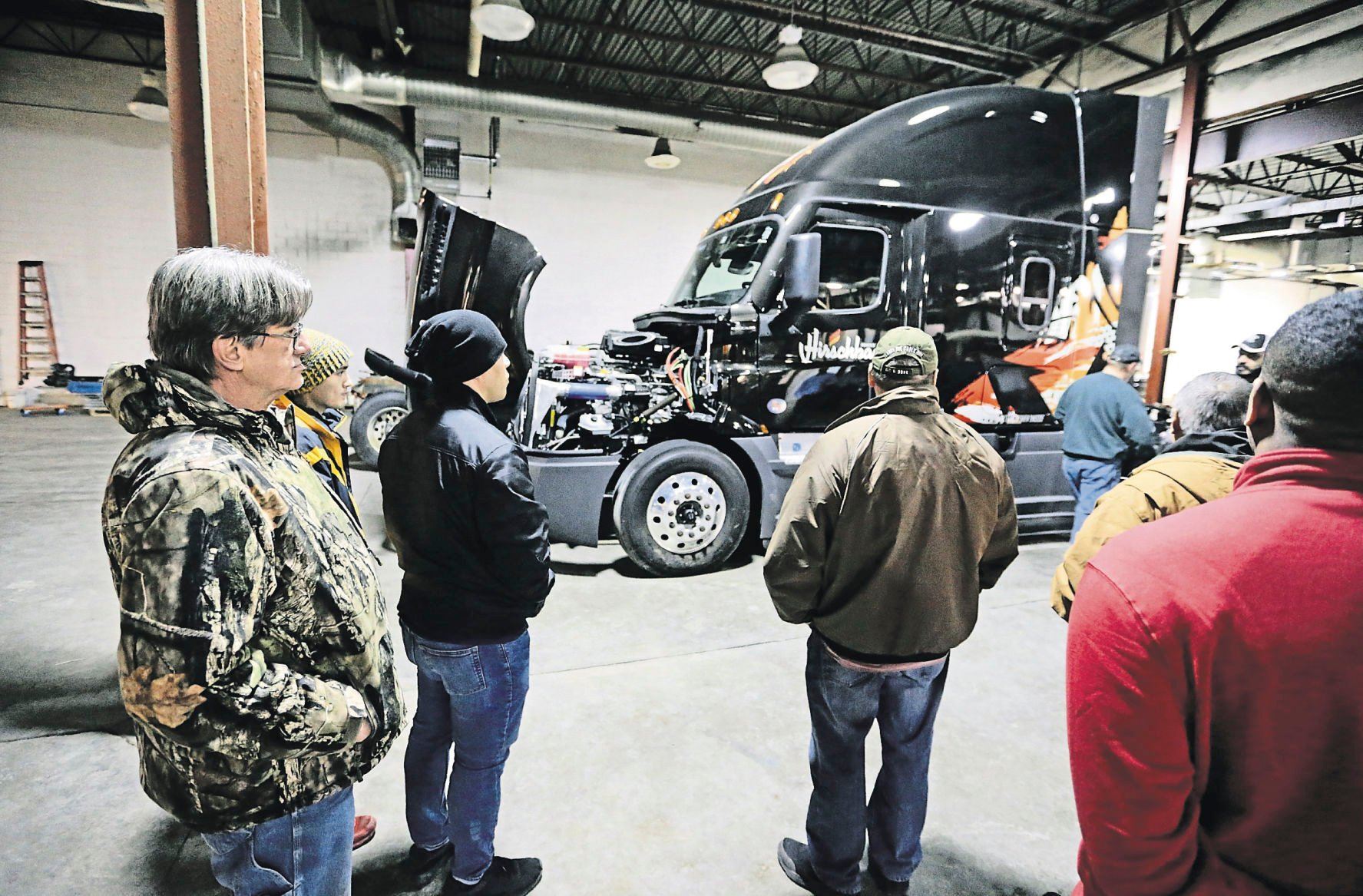 People enrolled in the commercial driver’s license training program at Hirschbach Motor Lines take part in the class in Dubuque.    PHOTO CREDIT: JESSICA REILLY
