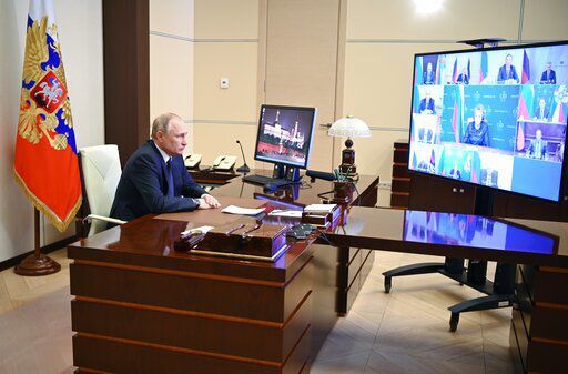 Russian President Vladimir Putin chairs a Security Council meeting via videoconference at the Novo-Ogaryovo residence outside Moscow, Russia, Thursday, March 3, 2022. (Andrei Gorshkov, Sputnik, Kremlin Pool Photo via AP)    PHOTO CREDIT: Andrei Gorshkov