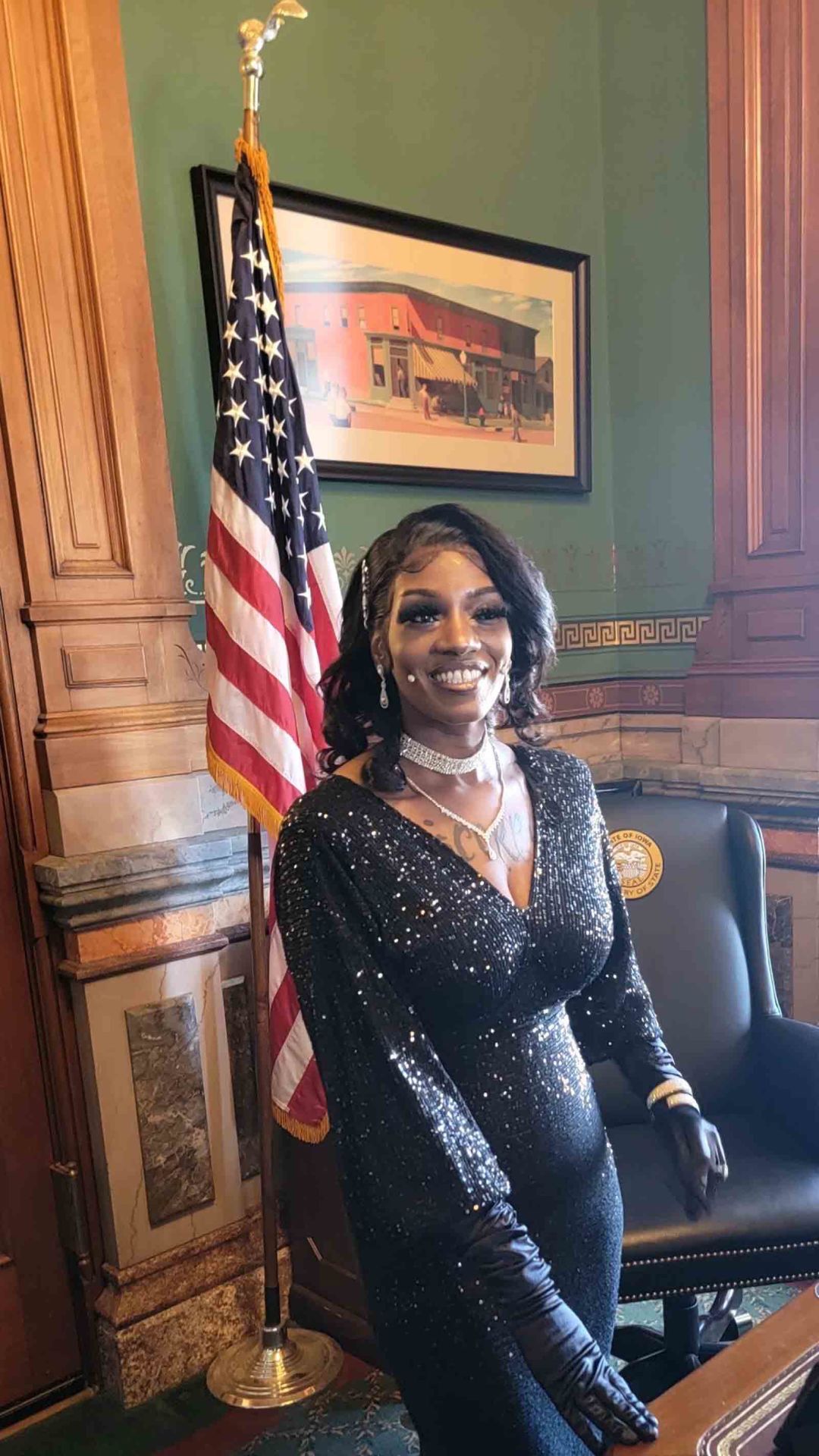 Erica Brewer, owner of Belle Allure Minkz and Boutique in Dubuque, in the Iowa Capitol in Des Moines on Thursday. Brewer was awarded the Deb Dalziel Woman Entrepreneur of the Year Award from America