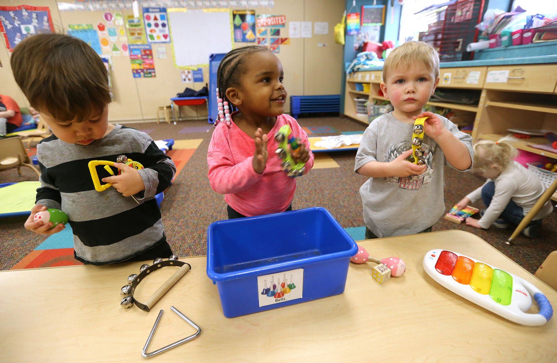 Boden Massena (from left), De’Ani Moore, Graham Joy and Palmer Frederick play with musical instruments at Hills & Dales’ Stoneman Road location in Dubuque on Friday.    PHOTO CREDIT: JESSICA REILLY, Telegraph Herald