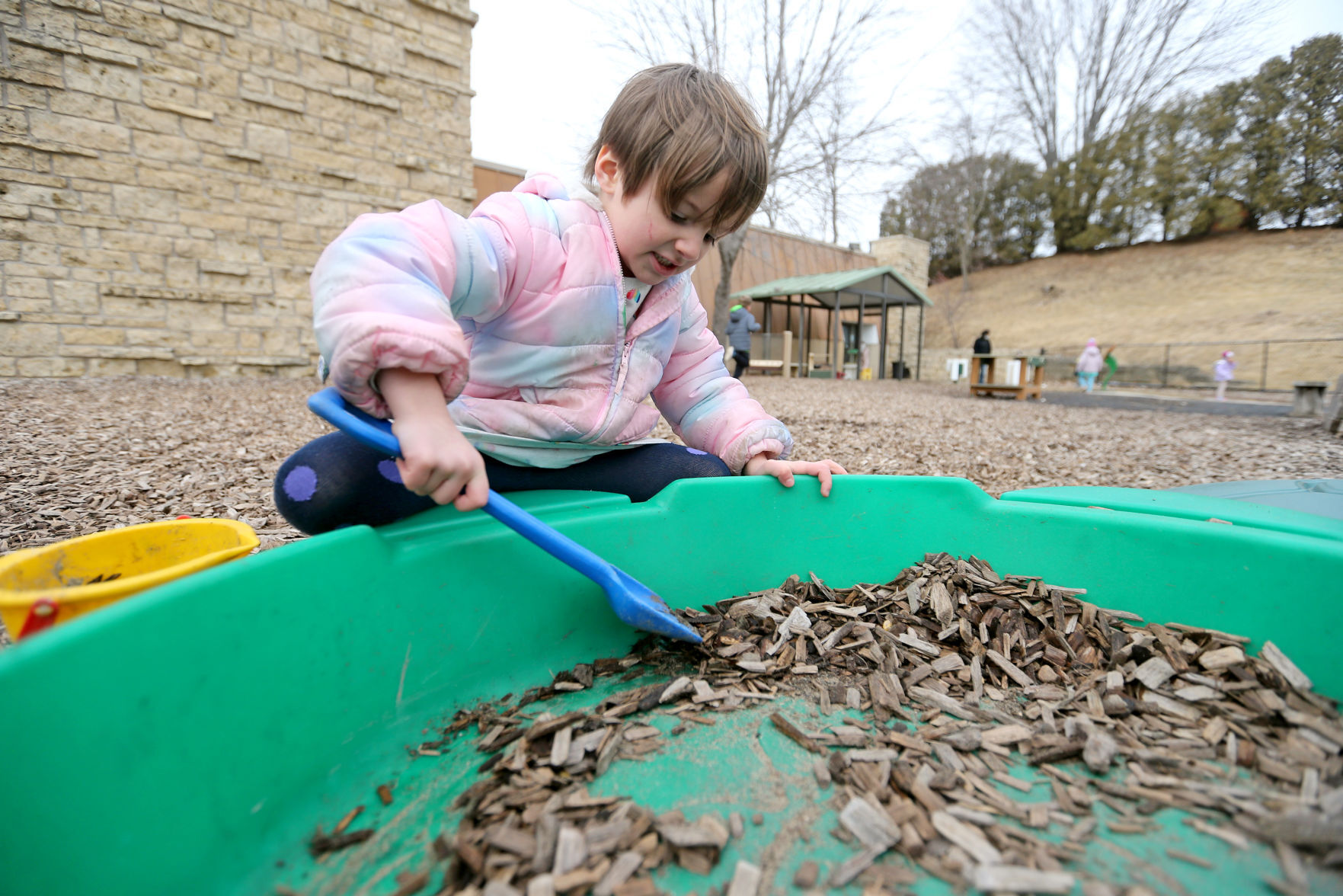 Cora Peil, 5, plays outside at Hills & Dales