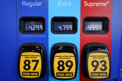 Gas prices appear on a pump at a gas station Monday, March 7, 2022, in Needham, Mass. The average price for a gallon of gasoline in the U.S. hits a record $4.17 on Tuesday as the country prepares to ban Russian oil imports. (AP Photo/Steven Senne)    PHOTO CREDIT: Steven Senne