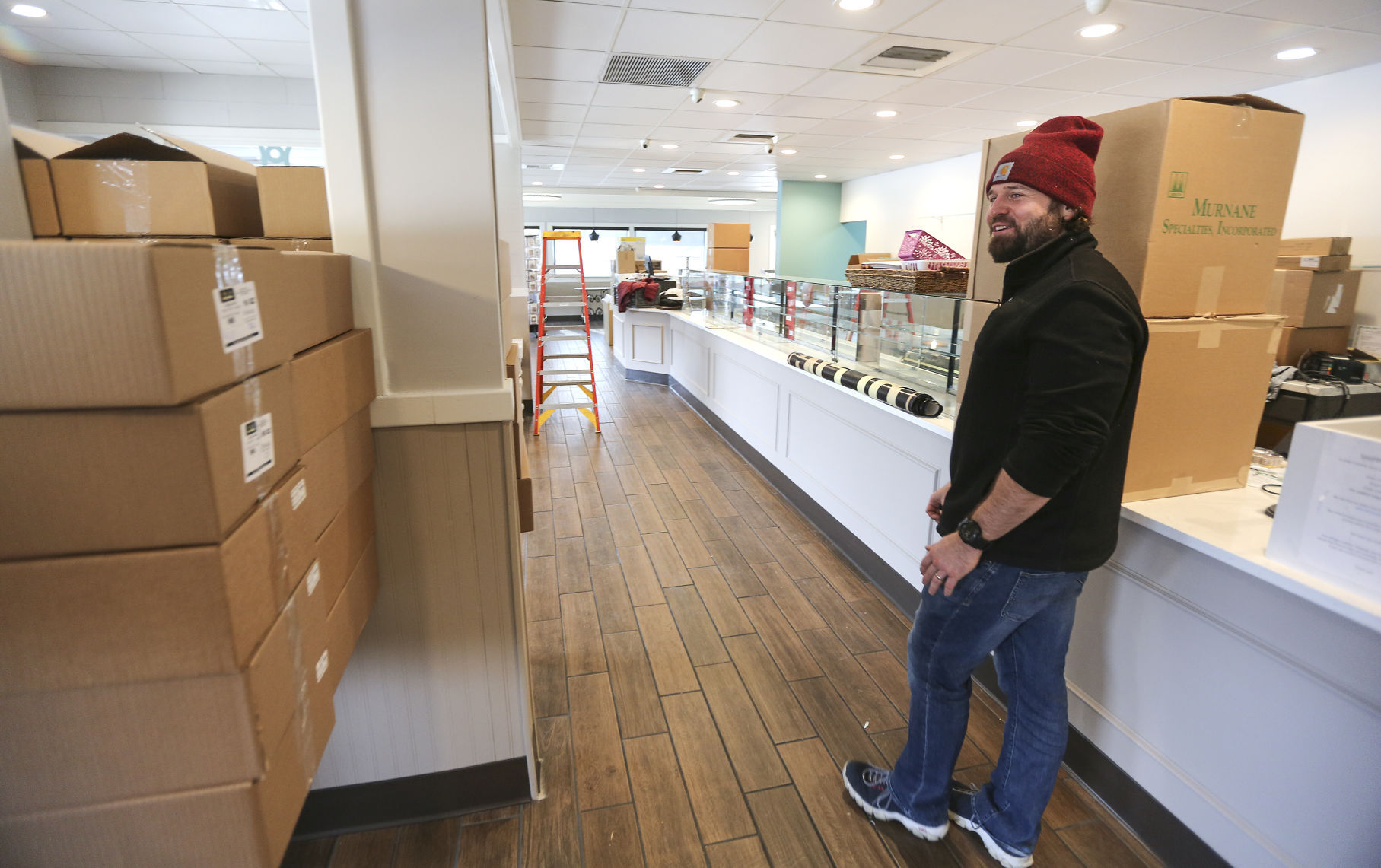 President of Betty Jane Candies, Drew Siegert, walks through the new location on John F. Kennedy Road, Tuesday, Feb. 15, 2022.    PHOTO CREDIT: Dave Kettering/Telegraph Herald