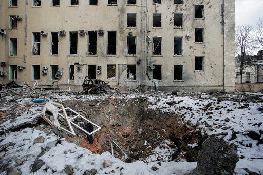 A view of a bomb crater after Russian shelling in the central of Kharkiv, Ukraine, Wednesday, March 16, 2022. (AP Photo/Pavel Dorogoy)    PHOTO CREDIT: Pavel Dorogoy
