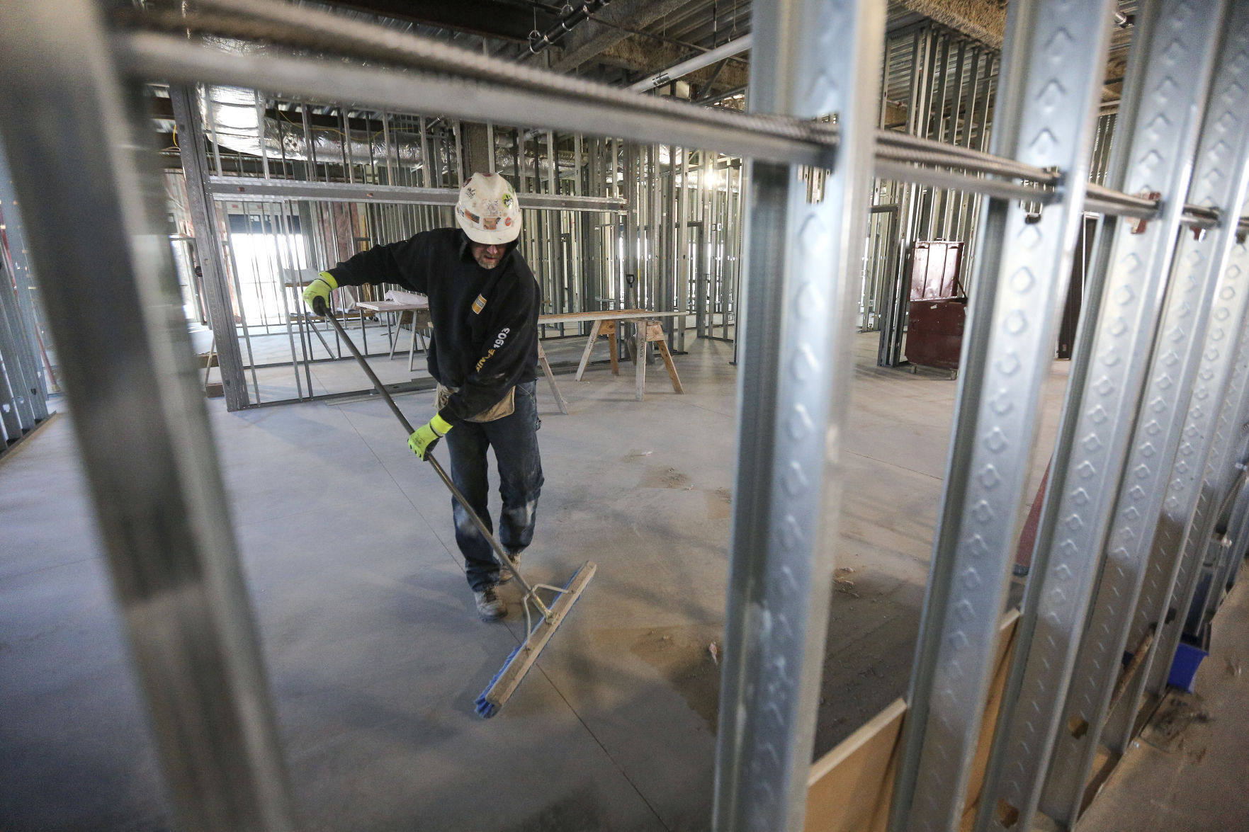Conlon Construction employee Tim Rife works inside the new Grand River Medical Center building on Westmark Drive in Dubuque.    PHOTO CREDIT: Dave Kettering