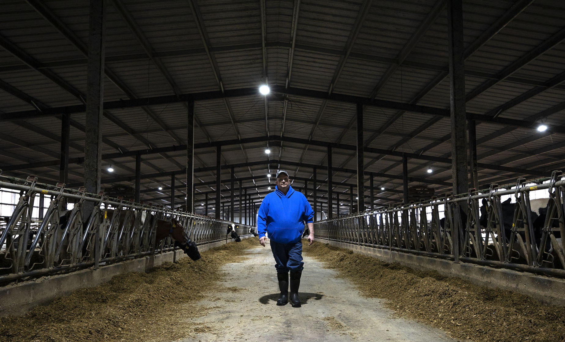 Peter Winch walks through one of the barns on his farm in rural Fennimore, Wis., on Wednesday, March 23, 2022.    PHOTO CREDIT: Stephen Gassman