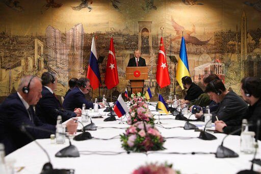 Turkish President Recep Tayyip Erdogan (center) gives a speech to welcome the Russian (left) and Ukrainian delegations ahead of their peace talks, in Istanbul, Turkey.    PHOTO CREDIT: Turkish Presidency via AP