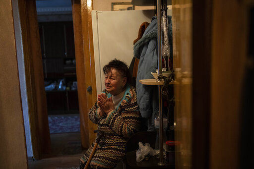 84 year-old widow, Alexandra Kulagina cries after receiving aid from the Red Cross in Mykolaiv Ukraine, Wednesday, April 6, 2022. (AP Photo/Petros Giannakouris)    PHOTO CREDIT: Petros Giannakouris