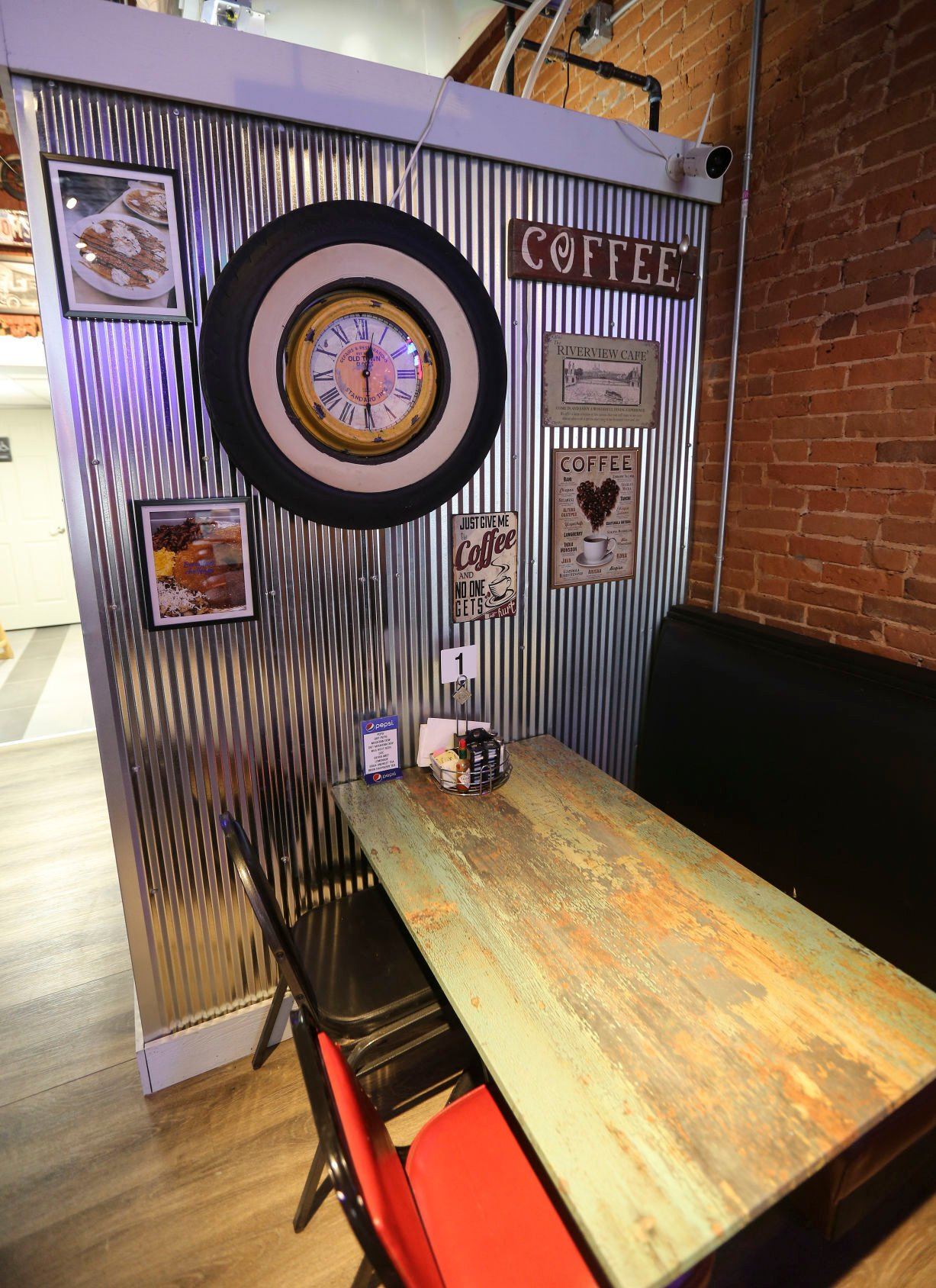 The atmosphere inside Foodie Garage Eatery in Dubuque, Tuesday, April 5, 2022.    PHOTO CREDIT: Dave Kettering
