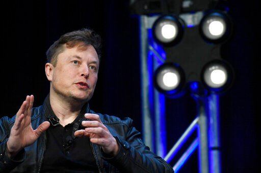 FILE - Tesla and SpaceX Chief Executive Officer Elon Musk speaks at the SATELLITE Conference and Exhibition in Washington. Musk won