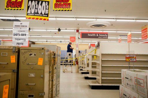 While many shelves are empty, furniture and fixtures are on still on sale at the Kmart in Avenel, N.J., Monday, April 4, 2022. When the Kmart in Avenel closes its doors on April 16, it will leave only three remaining U.S. locations for the former retail powerhouse. It