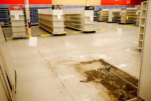 Large sections of a Kmart have already been emptied before its closing in Avenel, N.J., Monday, April 4, 2022. When the store closes its doors on April 16, it will leave only three remaining U.S. locations for the former retail powerhouse. It