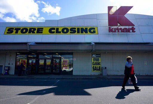 A woman leaves a Kmart in Avenel, N.J., Monday, April 4, 2022. When the New Jersey store closes its doors on April 16, it will leave only three remaining U.S. locations for the former retail powerhouse. It