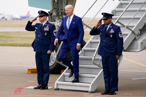 President Joe Biden arrives on Air Force One at Des Moines International Airport, in Des Moines Iowa, Tuesday, April 12, 2022, en route to Menlo, Iowa. (AP Photo/Carolyn Kaster)    PHOTO CREDIT: Carolyn Kaster