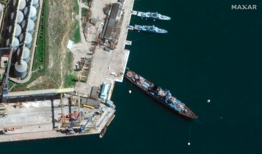 This satellite image provided by Maxar Technologies shows cruiser Moskva in port Sevastopol in Crimea on April 7. Ukraine says it hit and seriously damaged the flagship of Russia’s Black Sea fleet. That could deal a major setback to Moscow’s forces as they try to regroup for a renewed offensive in eastern Ukraine after retreating from much of the north, including the capital.     PHOTO CREDIT: Maxar Technologies via AP