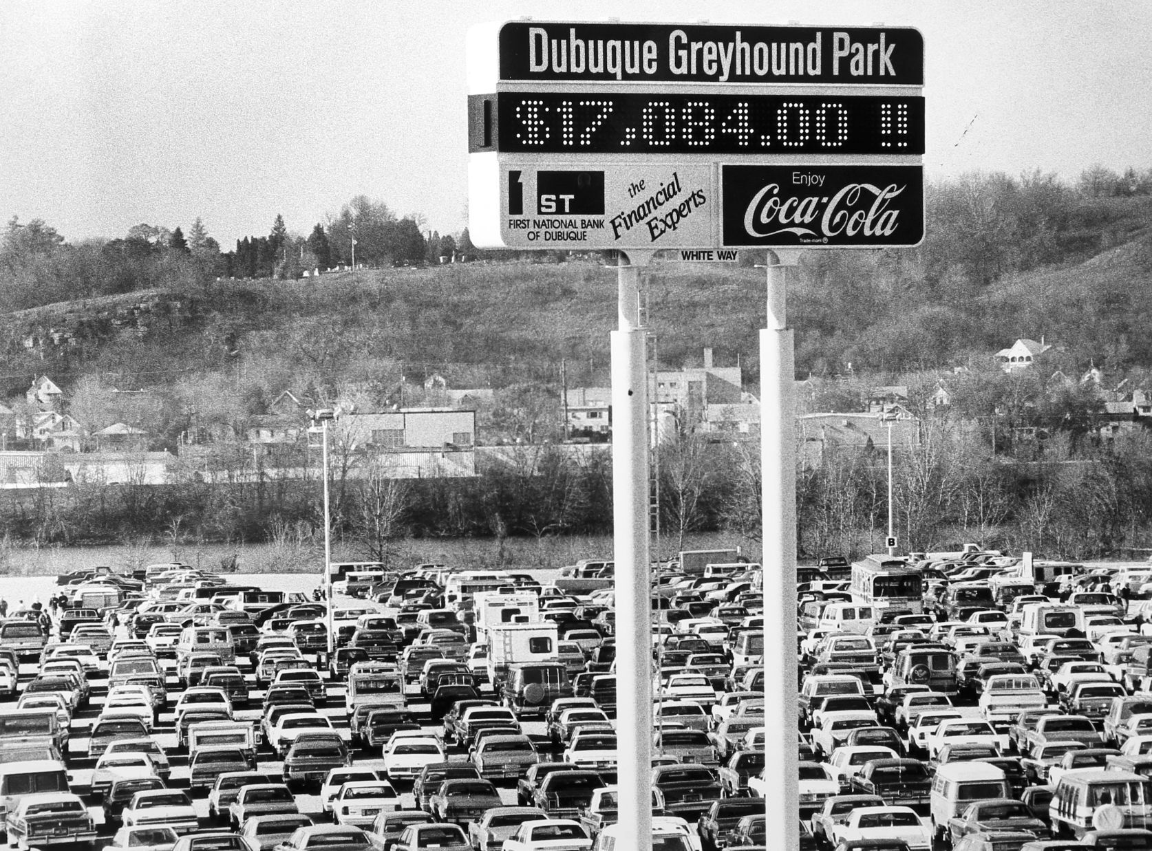 Cars fill the parking lot at Dubuque Greyhound Park in 1985.    PHOTO CREDIT: Telegraph Herald file