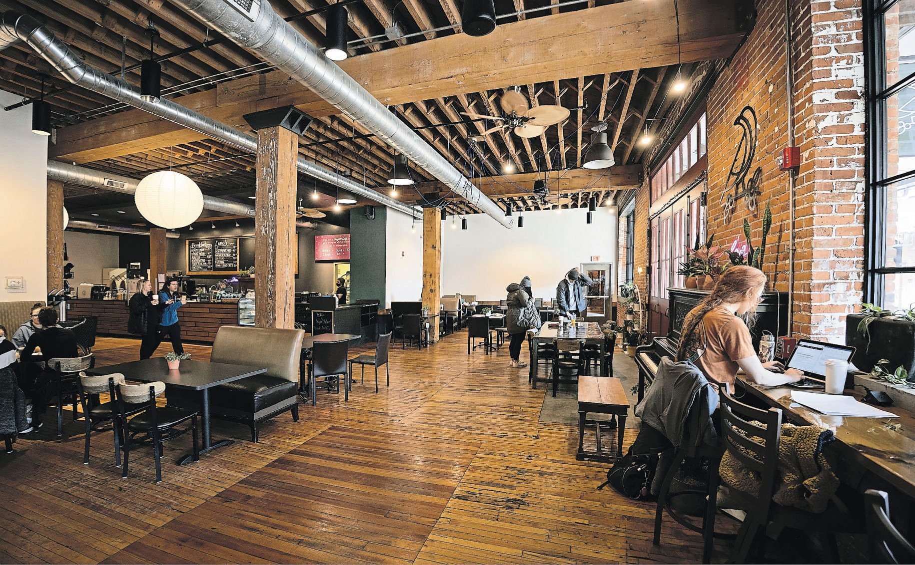 The interior of Wayfarer Coffee, one of numerous local shops in Dubuque.    PHOTO CREDIT: Stephen Gassman