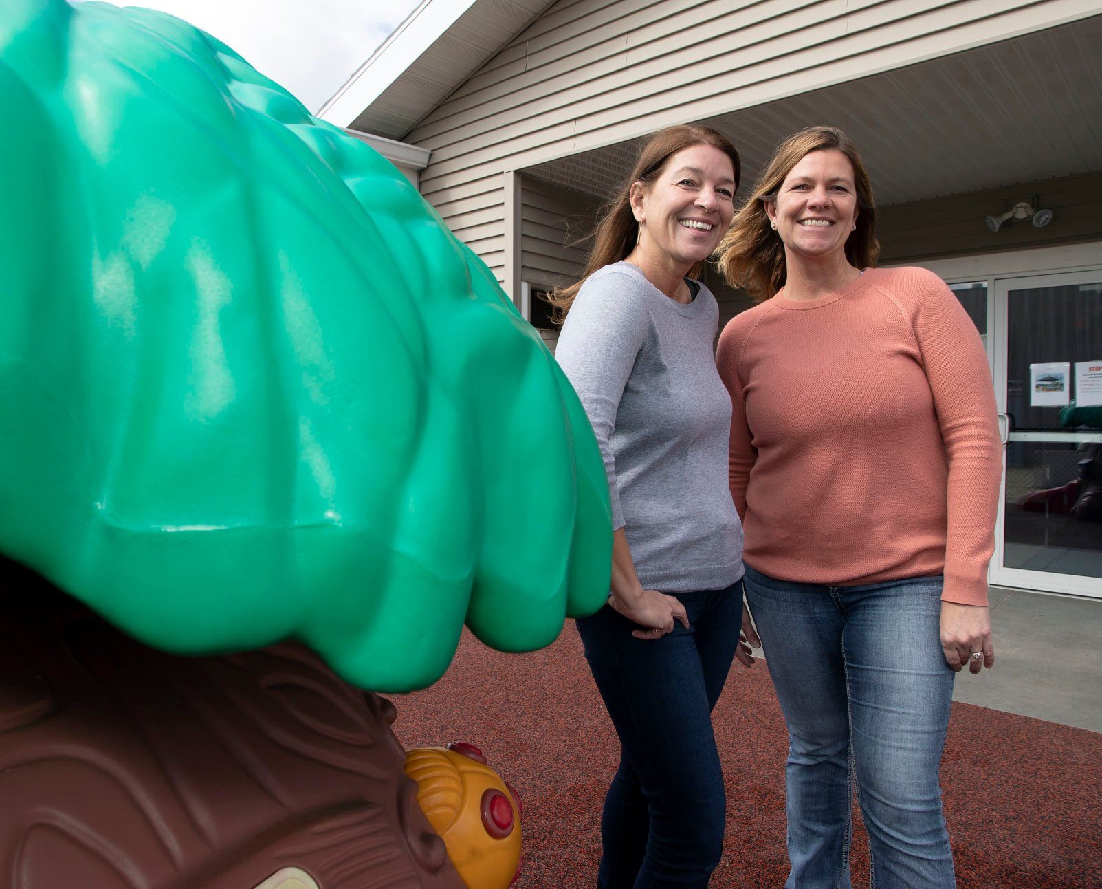 Directors Deb McDonnell (left) and Barb Weber outside Young-Uns Chid Care Center in Dubuque on Monday.    PHOTO CREDIT: Stephen Gassman
