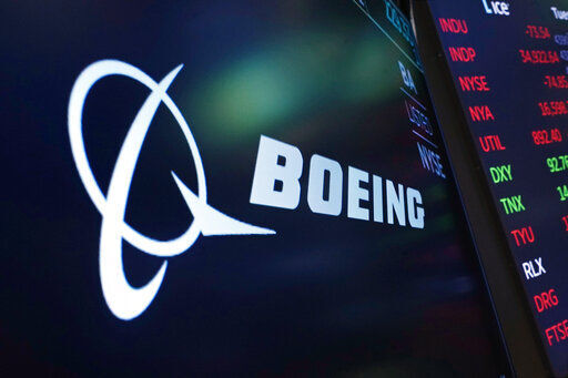 Boeing is reporting a money-losing quarter as both its civilian-airplane division and the defense business are struggling. Boeing said today that it lost $1.24 billion in the first quarter and took large write-downs for several programs.     PHOTO CREDIT: Richard Drew