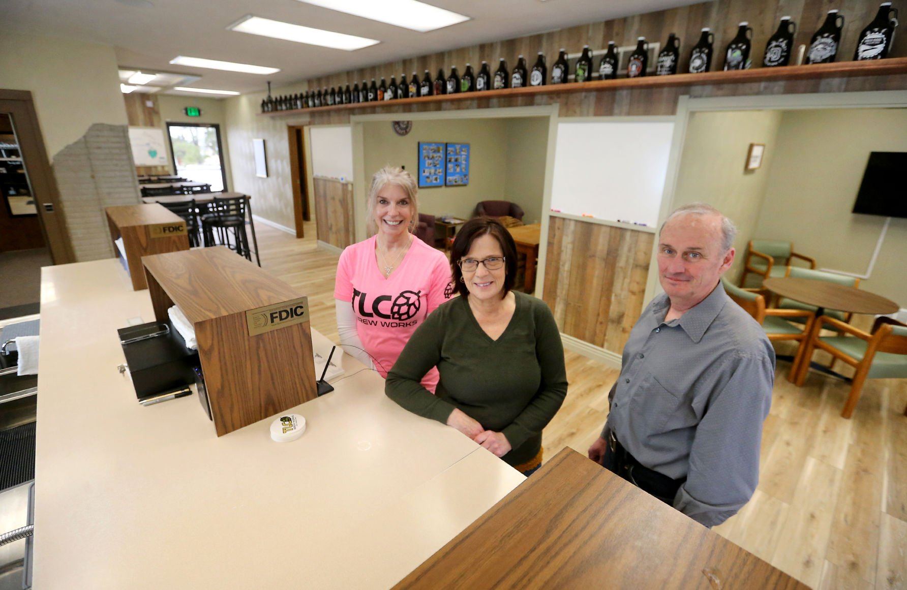 Carol Woten (from left), Linda Roling and her husband, Tom, are opening TLC Brew Works in Holy Cross, Iowa.    PHOTO CREDIT: JESSICA REILLY