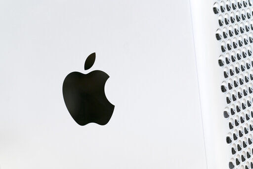 FIE - This May 21, 2021, photo shows the Apple logo displayed on a Mac Pro desktop computer in New York. Apple on Thursday, April 28, 2022, reported quarterly results that topped analysts