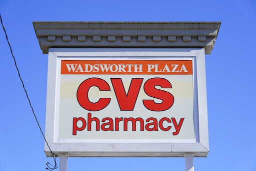 COVID-19 vaccines and tests for the virus continued to boost CVS Health in the first quarter, and the health care giant finally raised its annual forecast. The drugstore chain and pharmacy benefit manager said today that it now expects earnings of $8.20 to $8.40 per share for 2022.     PHOTO CREDIT: Matt Rourke