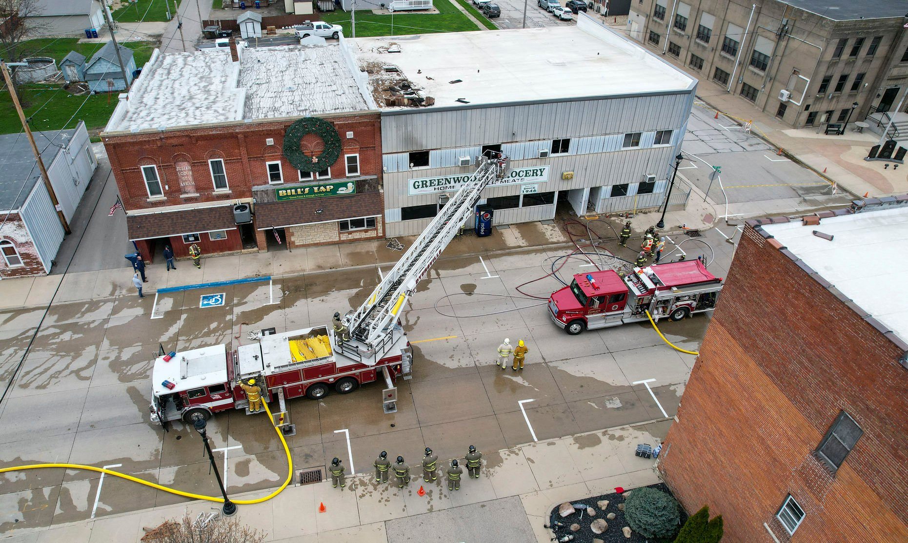 Greenwood’s Grocery and the apartments above it in Farley, Iowa, are a total loss after a fire broke out Friday morning.    PHOTO CREDIT: Dave Kettering, Telegraph Herald