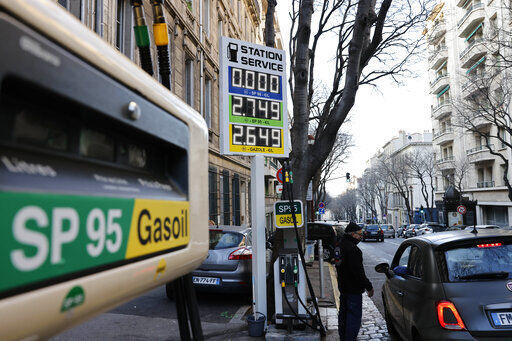 A car stops in a gas station where prices are up to 2,75 euros per liter in Marseille, southern France. The European Union slashed its forecasts of economic growth in the 27-nation bloc amid the prospect of a drawn-out Russian war in Ukraine and disruptions to EU energy trade.    PHOTO CREDIT: Jean-Francois Badias
