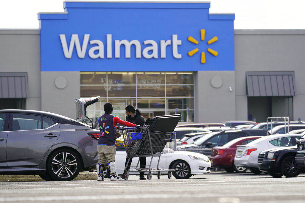 Walmart reported stronger sales for the first quarter, but its profit took a beating as the nation’s largest retailer grappled with surging inflation on food and fuel and higher costs from a snarled global supply chain.    PHOTO CREDIT: Matt Rourke