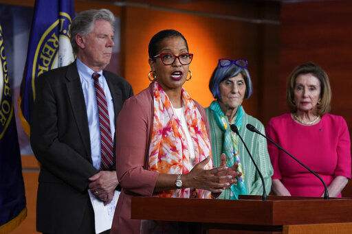 Rep. Jahana Hayes, D-Conn., chair of the House Subcommittee on Nutrition, joined from left by House Energy and Commerce Chairman Frank Pallone, D-N.J., Rep. Rosa DeLauro, D-Conn., the House Appropriations Committee chair, and Speaker of the House Nancy Pelosi, D-Calif., talks to reporters as House Democrats unveil a $28 million emergency spending bill to address the shortage of infant formula in the United States, at the Capitol in Washington, Tuesday, May 17, 2022. DeLauro, the chair of the House Appropriations Committee, says the bill would help the Food and Drug Administration take important steps to restore the formula supply in a safe and secure manner. (AP Photo/J. Scott Applewhite)    PHOTO CREDIT: J. Scott Applewhite