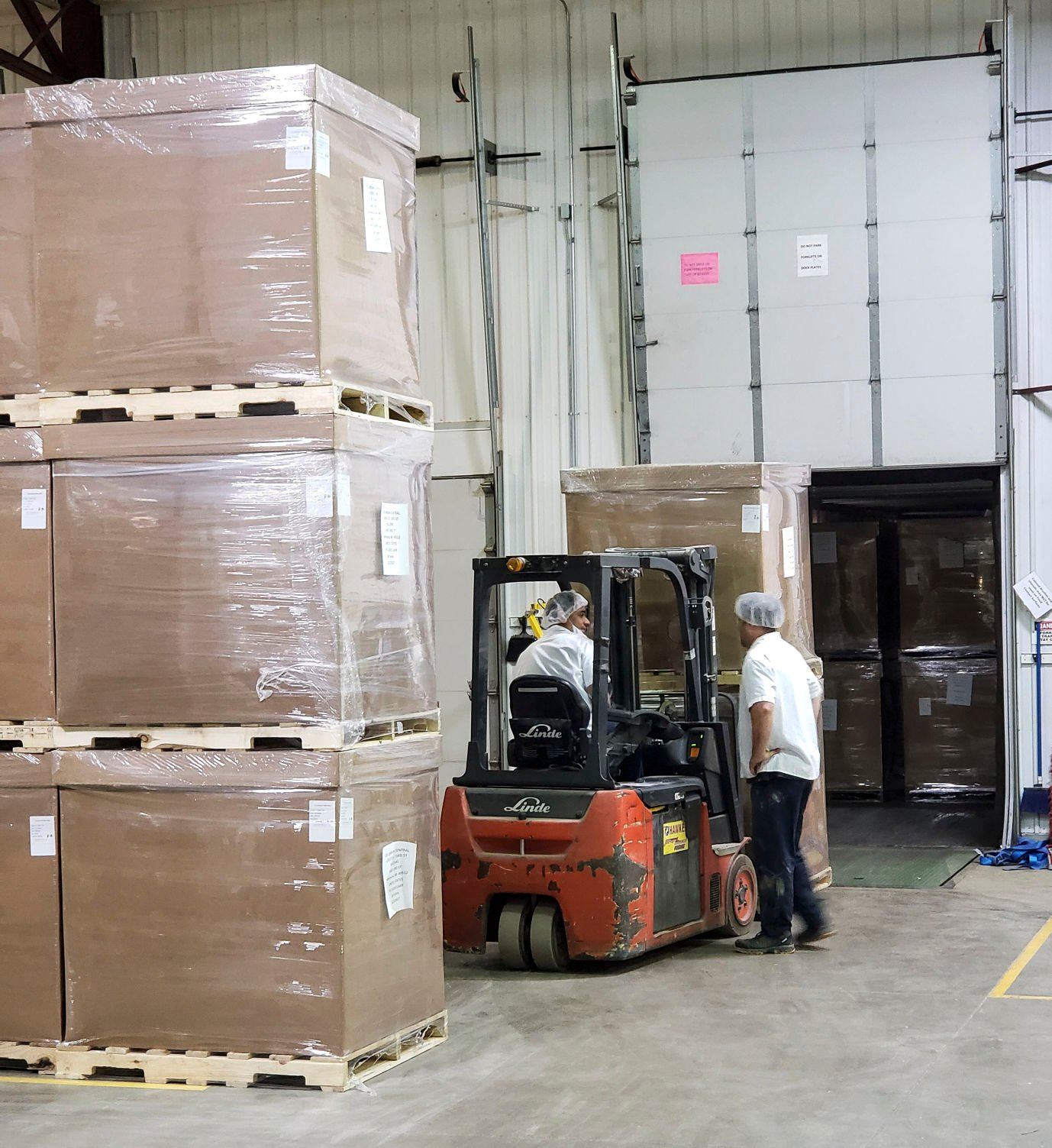 Ancient Brands Milling employees prepare a shipment of product at the company’s current Dyersville, Iowa, location.    PHOTO CREDIT: Contributed