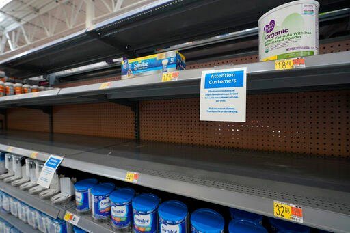 Shelves typically stocked with baby formula sit mostly empty at a store in San Antonio, Texas, last week.    PHOTO CREDIT: Eric Gay