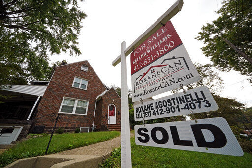 Freddie Mac reported today that long-term U.S. mortgage rates decreased slightly.    PHOTO CREDIT: Gene J. Puskar