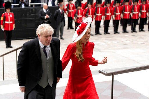 FILE - British Prime Minister Boris Johnson and his wife Carrie Symonds arrive for a service of thanksgiving for the reign of Queen Elizabeth II at St Paul