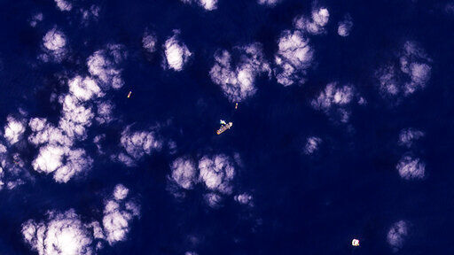 This satellite image from Planet Labs PBC shows the Marshall Islands-flagged Energean Power floating production storage and offloading vessel in the Karish Field area of the Mediterranean Sea Sunday, June 5, 2022. The Lebanese government invited on Monday, June 6, 2022, a U.S. envoy mediating between Lebanon and Israel over their disputed maritime border to return to Beirut as soon as possible to work out an agreement amid rising tensions along the border. On Sunday, Lebanon warned Israel not to start drilling in the Karish field and President Michel Aoun said maritime border negotiations have not ended, adding that any move by Israel will be considered “a provocation and hostile act.” (Planet Labs PBC via AP)    PHOTO CREDIT: Planet Labs PBC