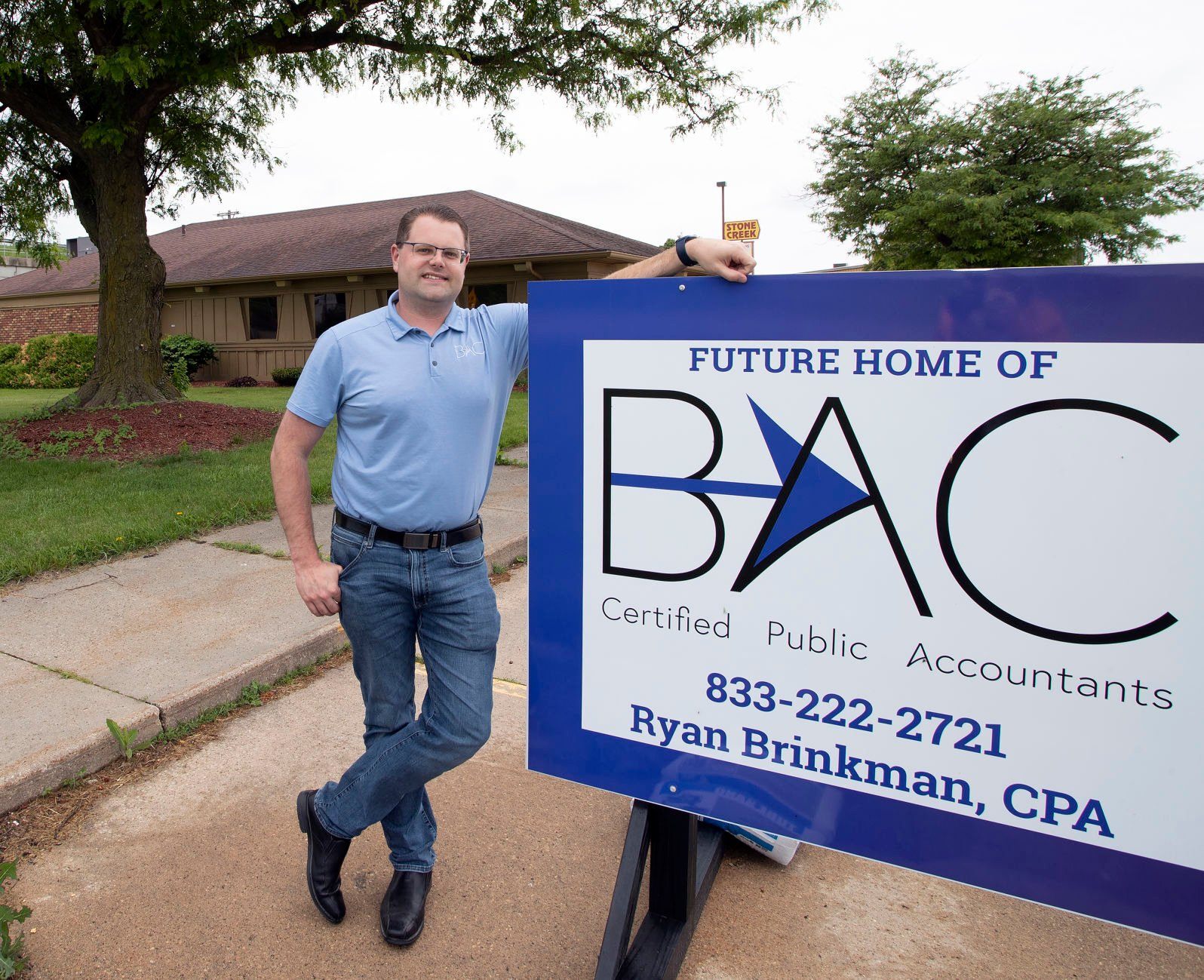 BAC Accounting owner Ryan Brinkman stands in front of the future home of the Dyersville, Iowa, firm on Friday, June 10, 2022.    PHOTO CREDIT: Stephen Gassman