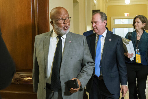 Chairman Bennie Thompson, D-Miss., followed by Rep. Adam Schiff, D-Calif., walk to the hearing room on Capitol Hill in Washington, Monday, June 13, 2022, for the public hearing of the House select committee investigating the Jan. 6 attack on the U.S. Capitol. (AP Photo/Manuel Balce Ceneta)    PHOTO CREDIT: Manuel Balce Ceneta