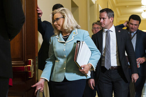 Rep. Liz Cheney, R-Wyo., followed by Rep. Adam Kinzinger, R-Ill., walk to the hearing room on Capitol Hill in Washington, Monday, June 13, 2022, for the public hearing of the House select committee investigating the Jan. 6 attack on the U.S. Capitol. (AP Photo/Manuel Balce Ceneta)    PHOTO CREDIT: Manuel Balce Ceneta