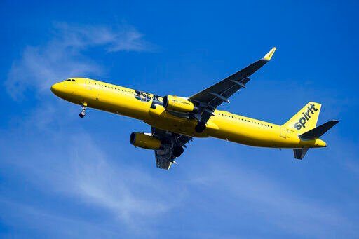 Spirit Airlines, the target of a budget airline bidding war, said today that it been in talks with JetBlue about last week’s buyout offer while remaining engaged with Frontier Airlines, with which Spirit has already signed a merger agreement.    PHOTO CREDIT: Matt Rourke