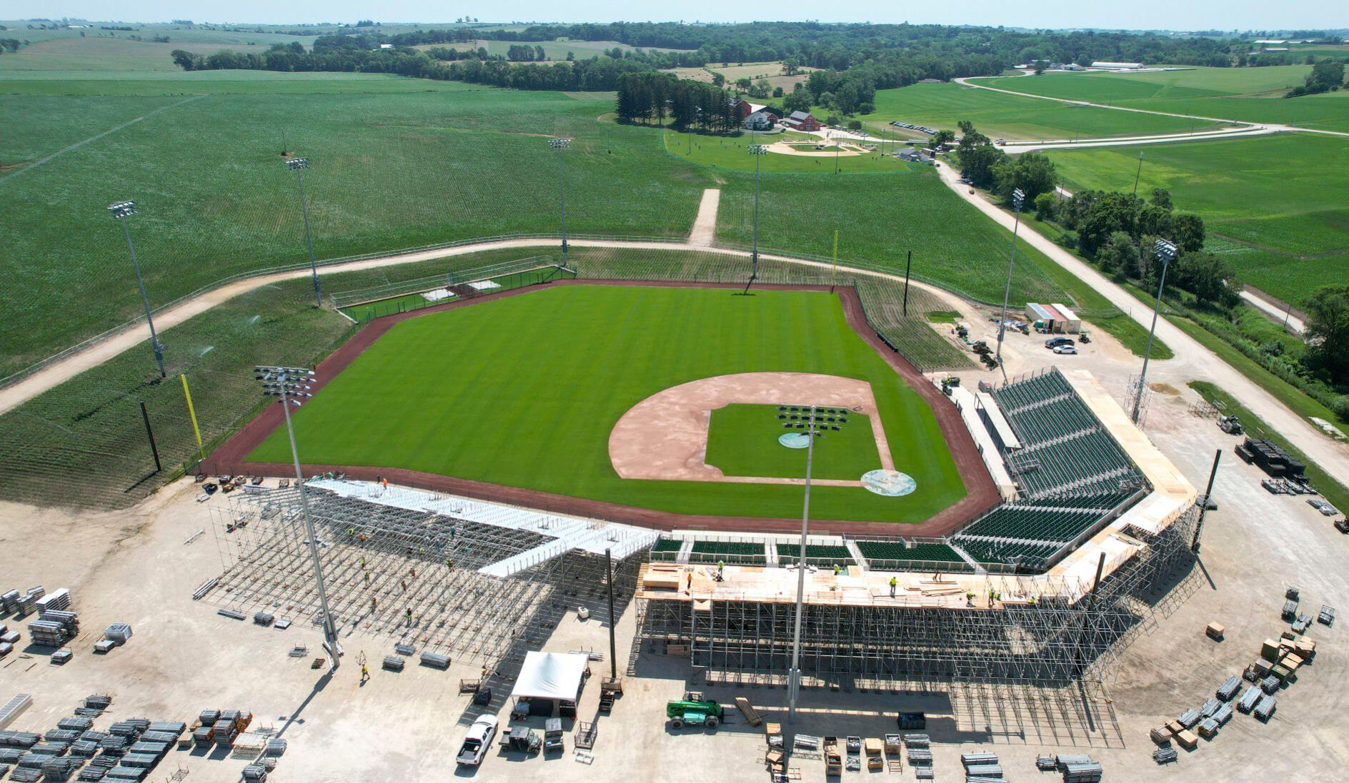 Work continues Tuesday on constructing the seats at the Major League Baseball field in Dyersville, Iowa.    PHOTO CREDIT: Dave Kettering
