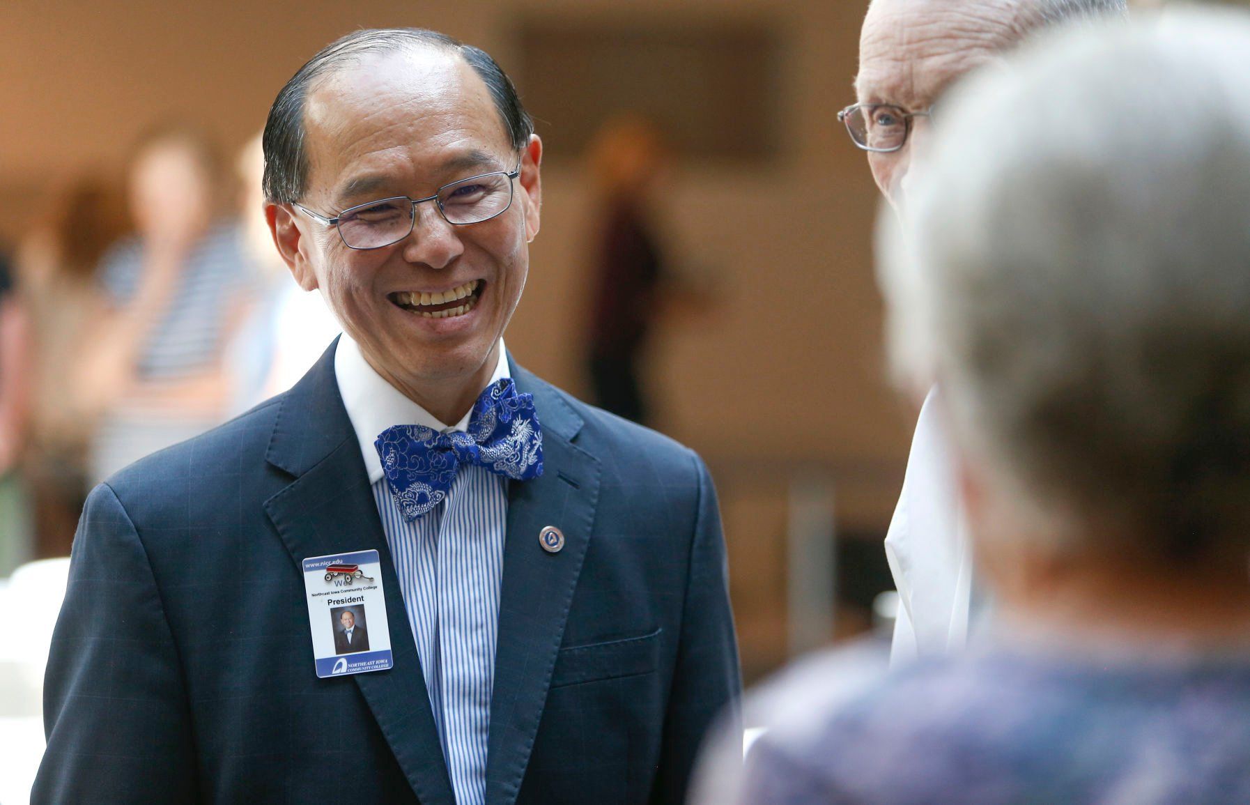 Departing Northeast Iowa Community College President Liang Chee Wee chats with friends during his goodbye ceremony held at the Peosta campus on, Wednesday, June 22, 2022.    PHOTO CREDIT: Dave Kettering