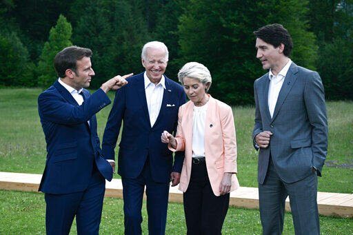 From left, President Emmanuel Macron, US President Joe Biden, European Commission President Ursula von der Leyen and Canada