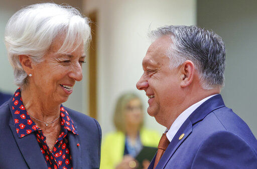 European Central Bank President Christine Lagarde speaks with Hungary