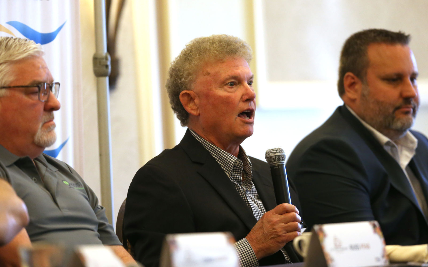 Dyersville, Iowa, Mayor Jeff Jacque speaks during the Dubuque Area Chamber of Commerce
