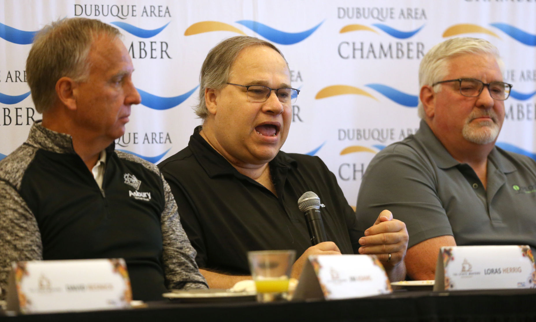 East Dubuque, Ill., City Administrator Loras Herrig speaks during the Dubuque Area Chamber of Commerce
