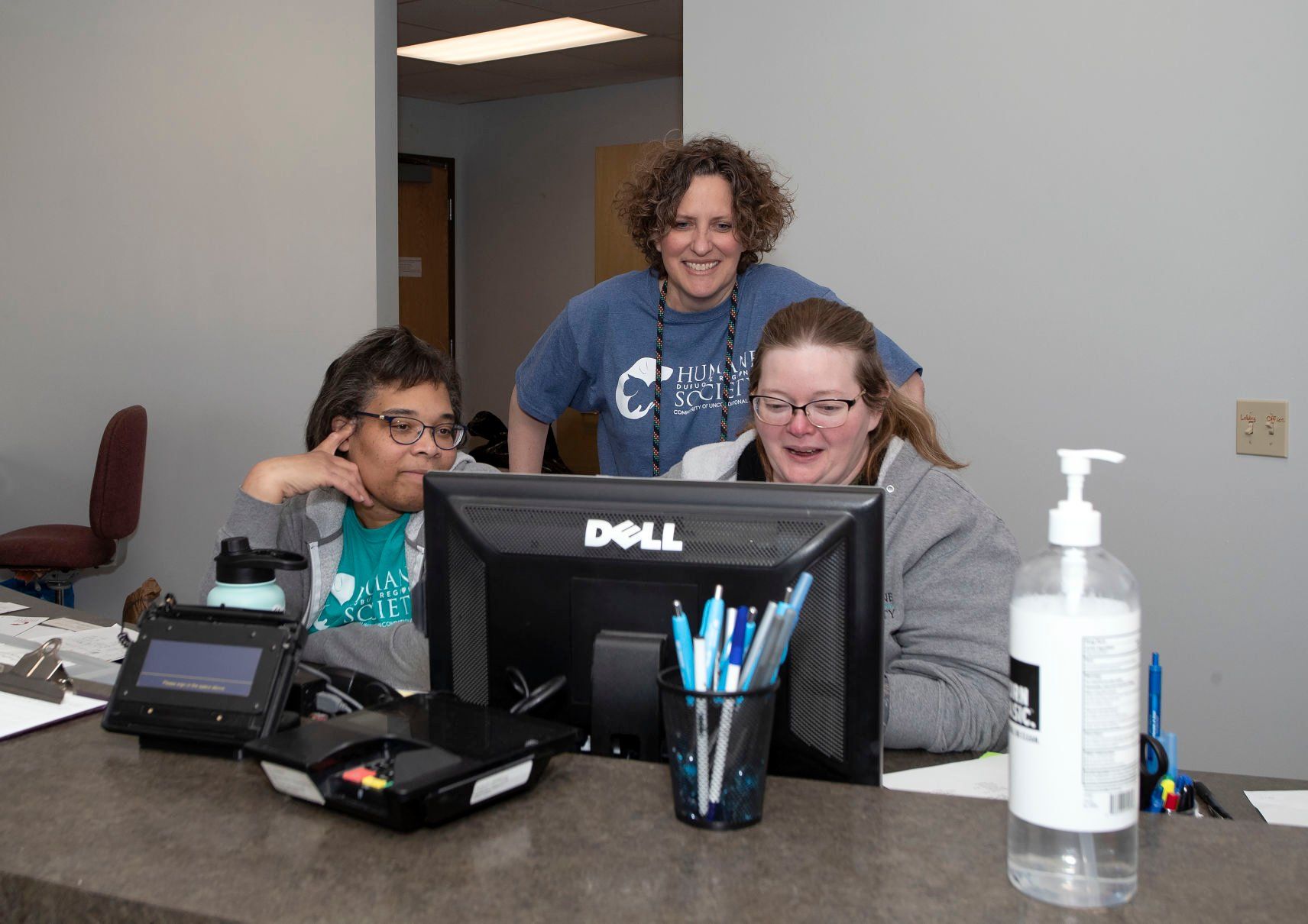 Executive Director, Noelle Chesney (center) works with Roberta Milligan (left) and Becca Cunningham at Dubuque Regional Humane Society in Dubuque on Wednesday, June 8, 2022.    PHOTO CREDIT: Stephen Gassman