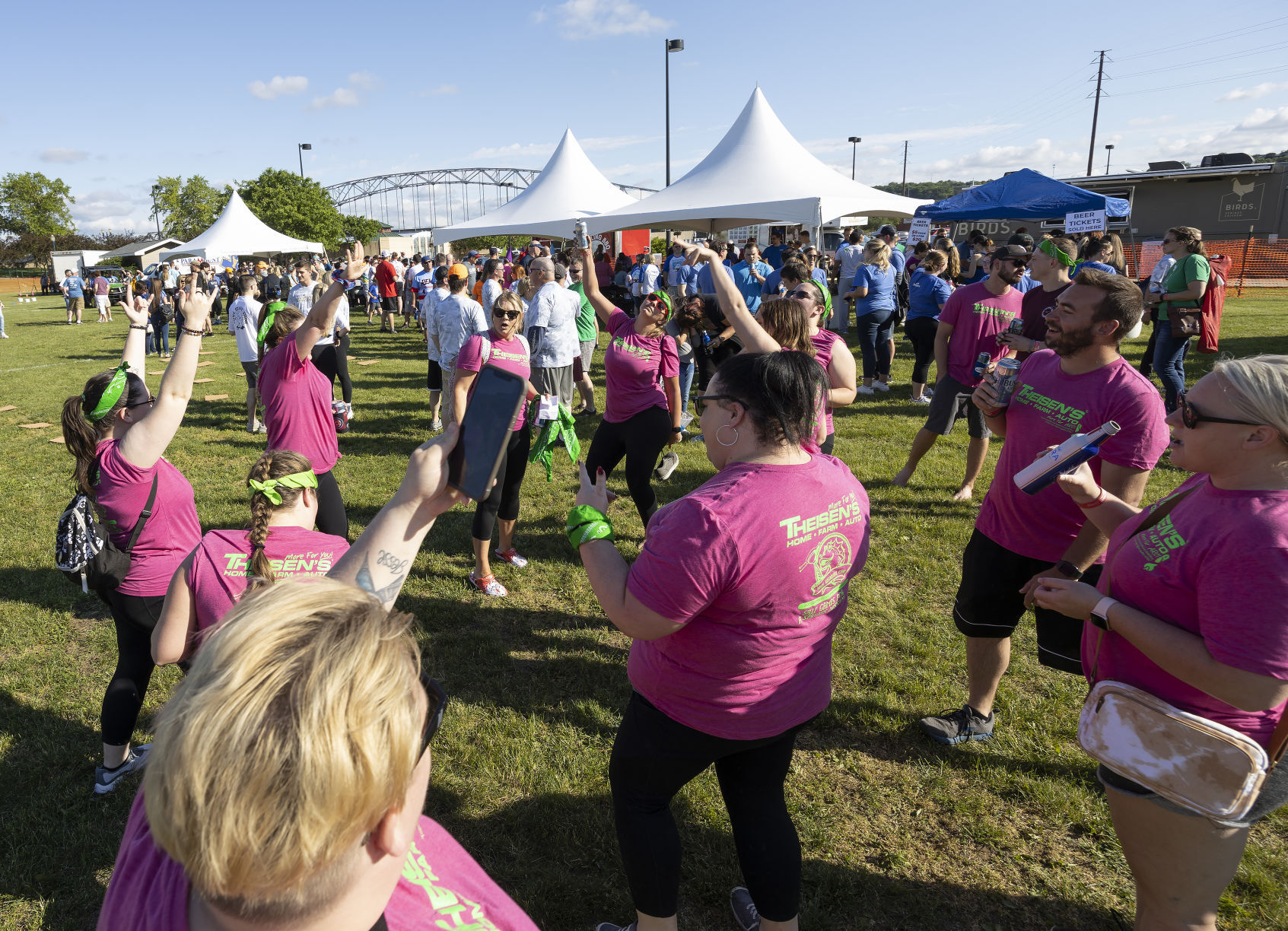 Members of team Theisen’s dance before the games begin at the Area Residential Care Corporate and Community game night at the Port of Dubuque on Friday, June 10.    PHOTO CREDIT: Stephen Gassman