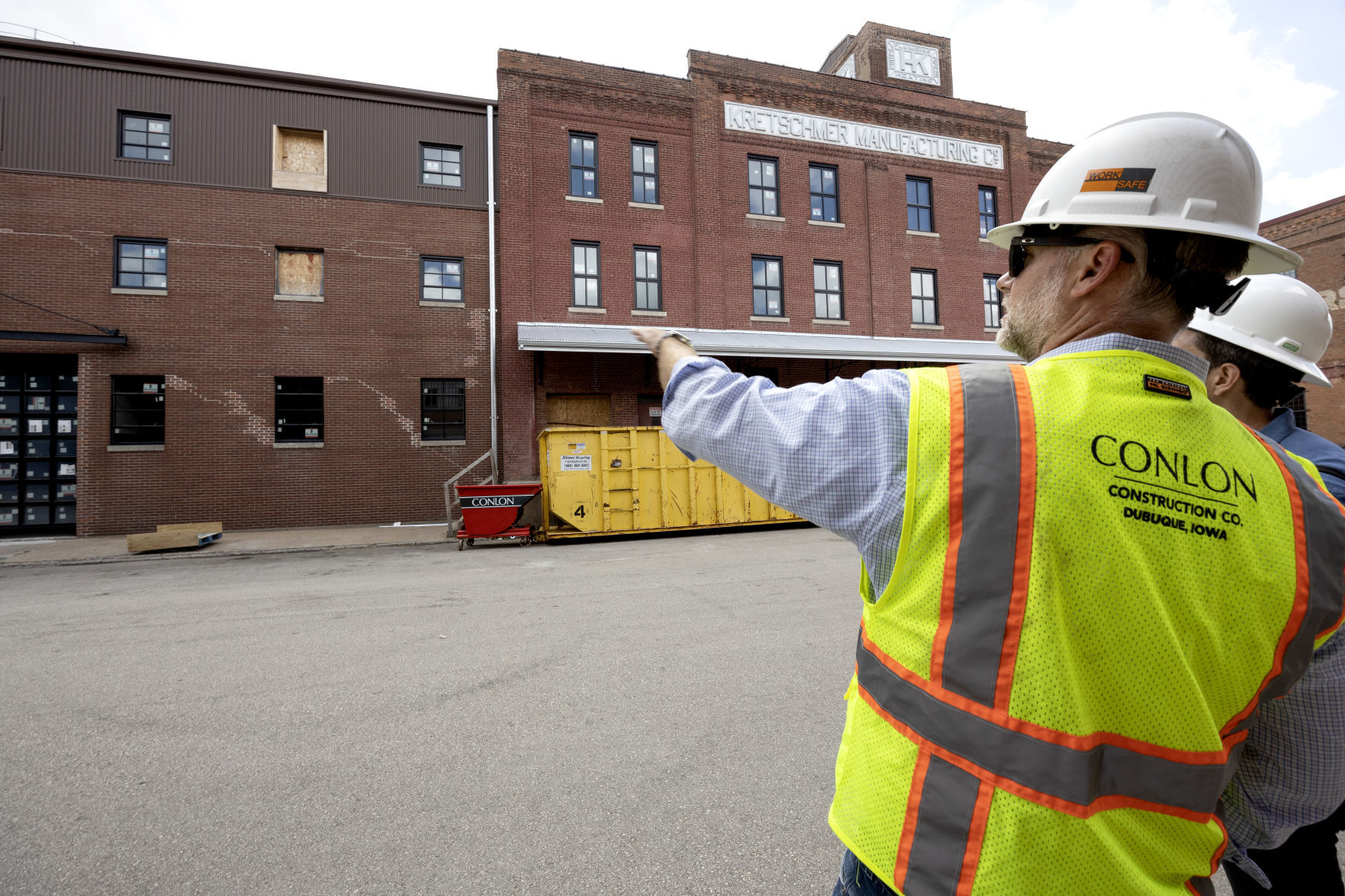 Conlon Construction President and Chief Operating Officer Matt Mulligan points out areas of the Kretschmer Manufacturing building, 220 E. Ninth St., on Thursday, July 7, 2022. The building will be home to 48 apartment units.    PHOTO CREDIT: Stephen Gassman